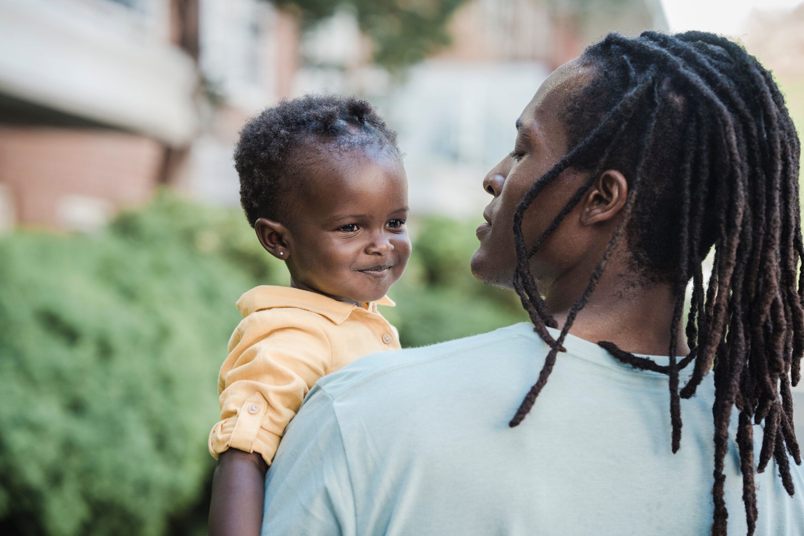 Smiling NYC family enjoying the peace of mind that comes with their MetroPlusHealth Gold Plan benefits.